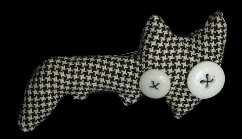 damien b. buttoneye