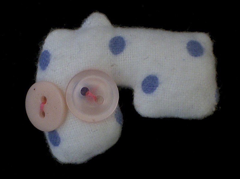 olga b. buttoneye