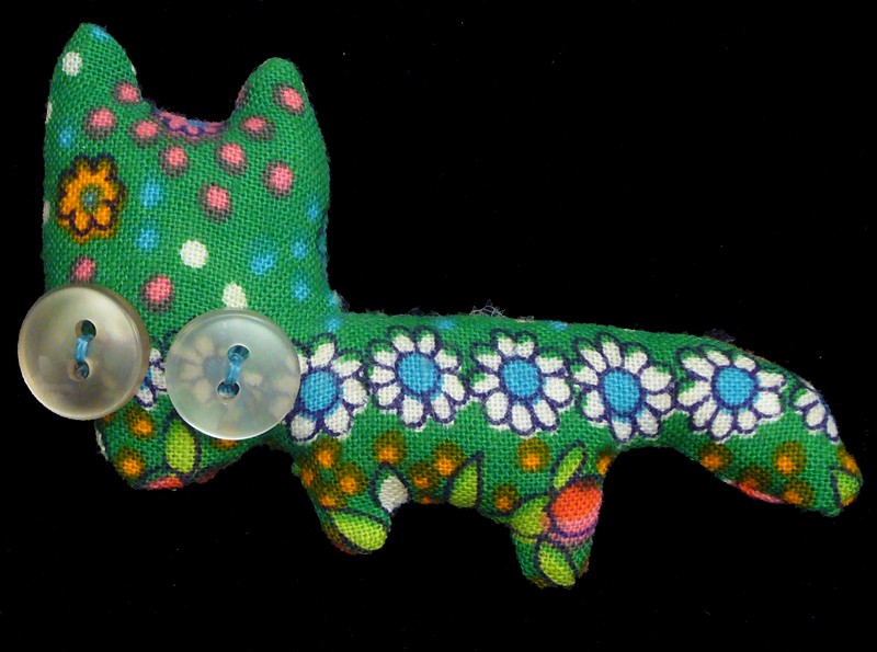 angela b. buttoneye