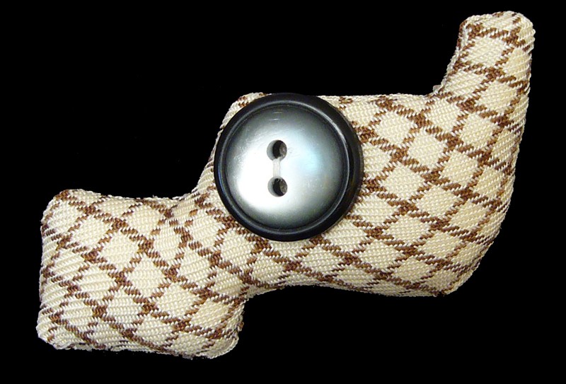 damian b. buttoneye